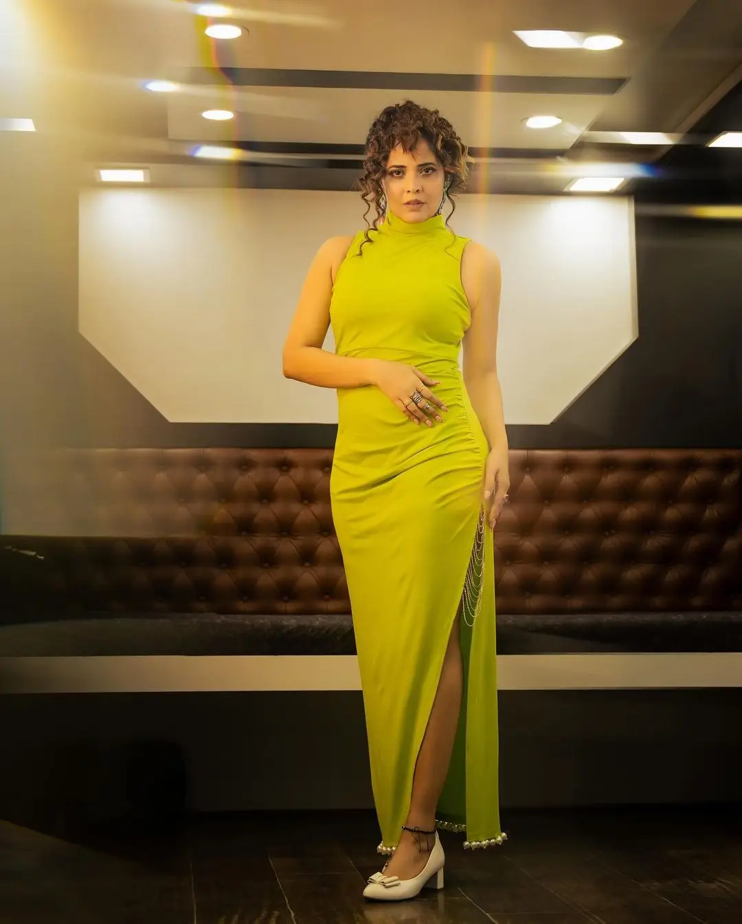 Anasuya Bharadwaj Long Legs Show in Lemon Green Gown